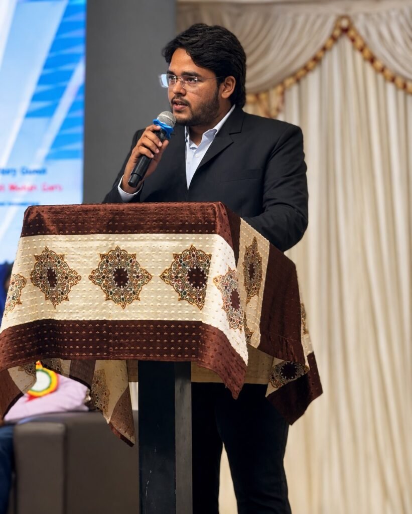 Maharshi (Pydi Rushendra) speaking at an event